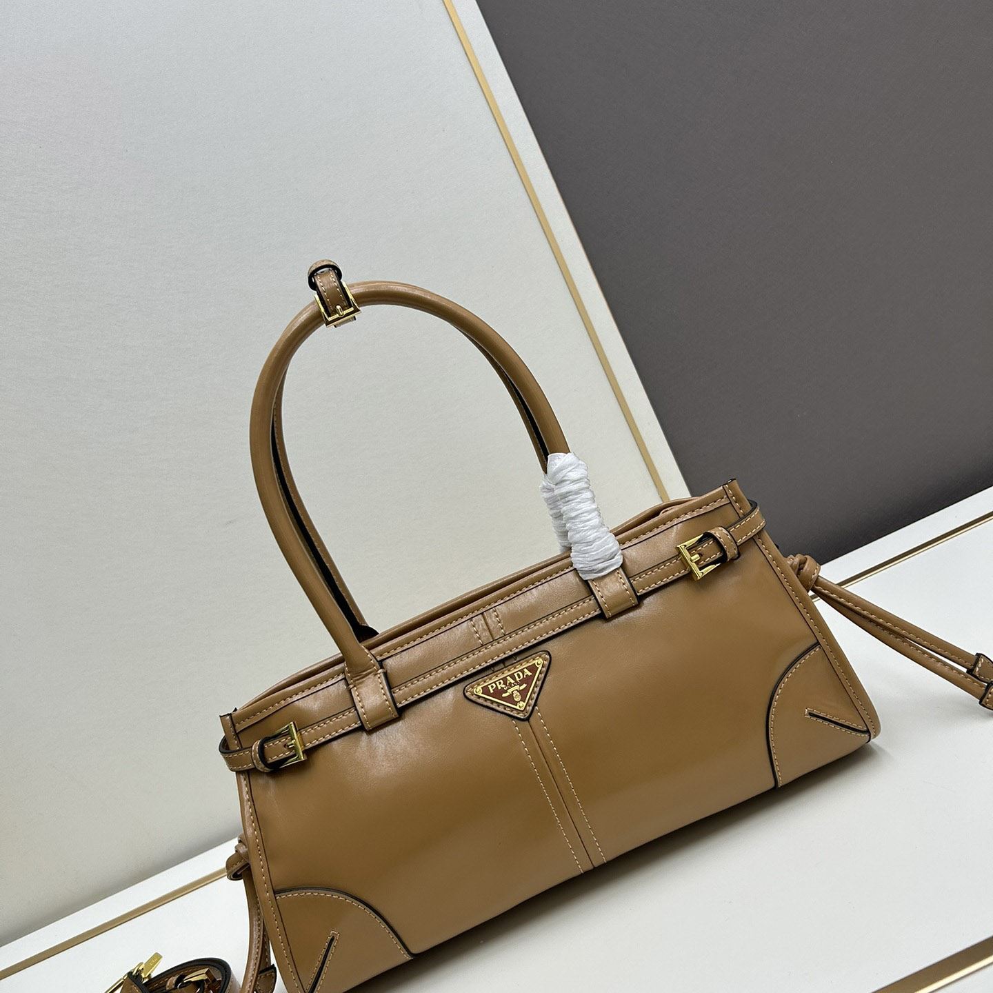 Pra*a top handle bags